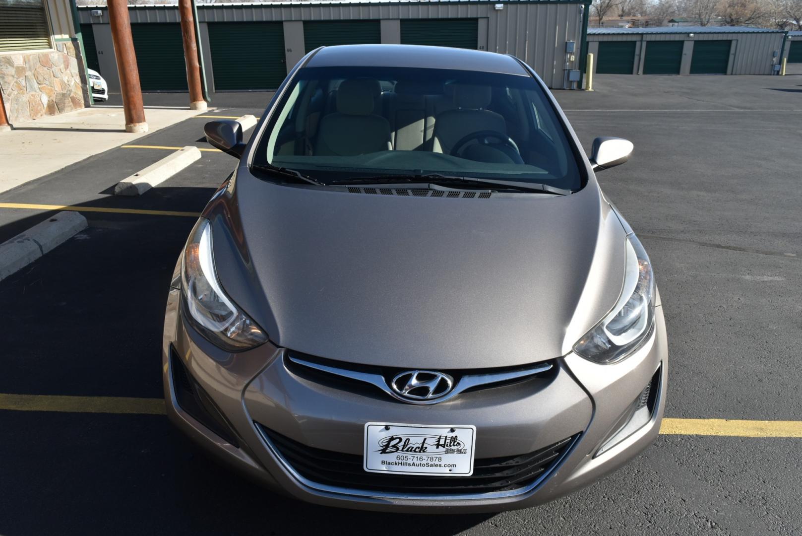 2016 Bronze Hyundai Elantra SE (5NPDH4AE3GH) with an 1.8L 4 Cyl engine, 6-Speed Automatic transmission, located at 1600 E Hwy 44, Rapid City, SD, 57703, (605) 716-7878, 44.070232, -103.171410 - Photo#1